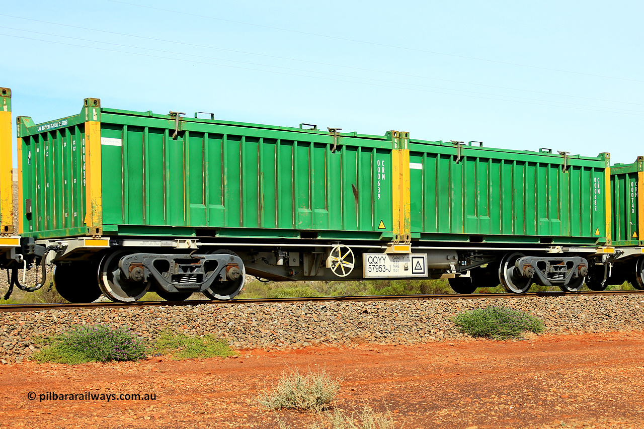 231020 8169
Parkeston, QQYY type 40' container waggon QQYY 57953 one of five hundred ordered by Aurizon and built by CRRC Yangtze Group of China in 2022. In service with two loaded 20' half height hard top 'rotainers' lettered CRM, for Cristal Mining before they were absorbed into Tronox, CRM 000682 with Cristal decal and yellow corner posts and CRM 000639 with Cristal decal and yellow corner posts, on Aurizon's Tronox mineral sands train 4UP1 from Ivanhoe / Broken Hill (NSW) to Kwinana (WA). 20th of October 2023.
Keywords: QQYY-type;QQYY57953;CRRC-Yangtze-Group-China;