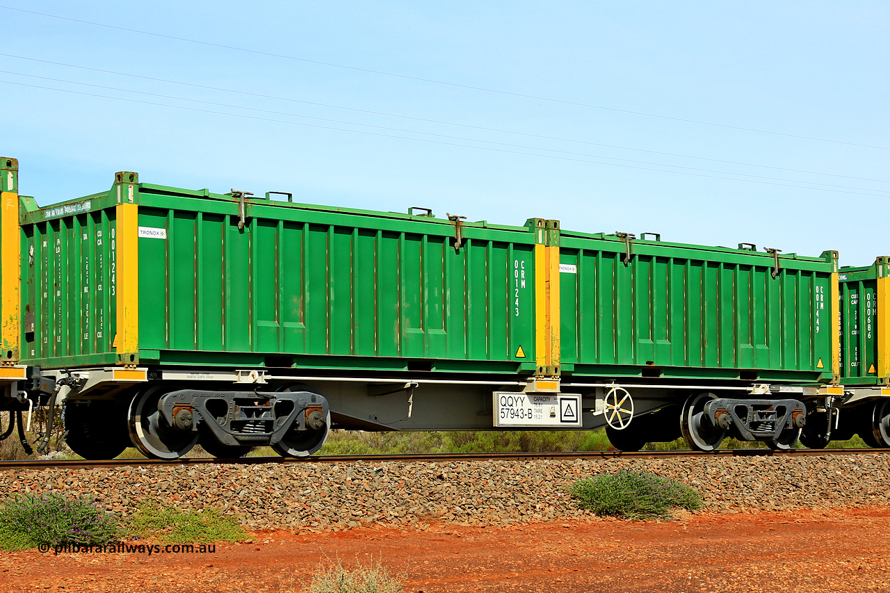 231020 8171
Parkeston, QQYY type 40' container waggon QQYY 57943 one of five hundred ordered by Aurizon and built by CRRC Yangtze Group of China in 2022. In service with two loaded 20' half height hard top 'rotainers' lettered CRM, for Cristal Mining before they were absorbed into Tronox, CRM 001449 with Tronox decal and yellow corner posts and CRM 001243 with Tronox decal and yellow corner posts, on Aurizon's Tronox mineral sands train 4UP1 from Ivanhoe / Broken Hill (NSW) to Kwinana (WA). 20th of October 2023.
Keywords: QQYY-type;QQYY57943;CRRC-Yangtze-Group-China;