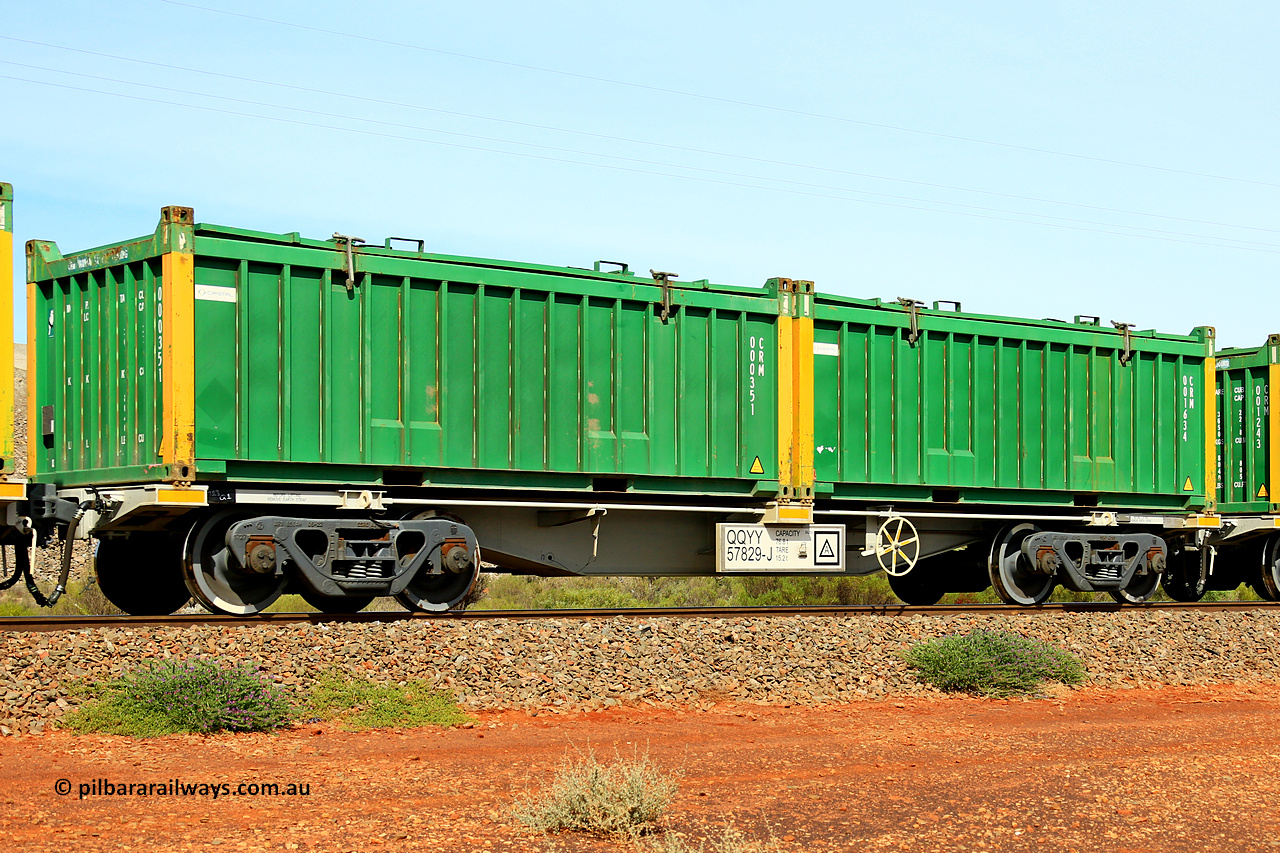 231020 8172
Parkeston, QQYY type 40' container waggon QQYY 57829 one of five hundred ordered by Aurizon and built by CRRC Yangtze Group of China in 2022. In service with two loaded 20' half height hard top 'rotainers' lettered CRM, for Cristal Mining before they were absorbed into Tronox, CRM 001634 with Cristal decal and yellow corner posts and CRM 000351 with Cristal decal and yellow corner posts, on Aurizon's Tronox mineral sands train 4UP1 from Ivanhoe / Broken Hill (NSW) to Kwinana (WA). 20th of October 2023.
Keywords: QQYY-type;QQYY57829;CRRC-Yangtze-Group-China;