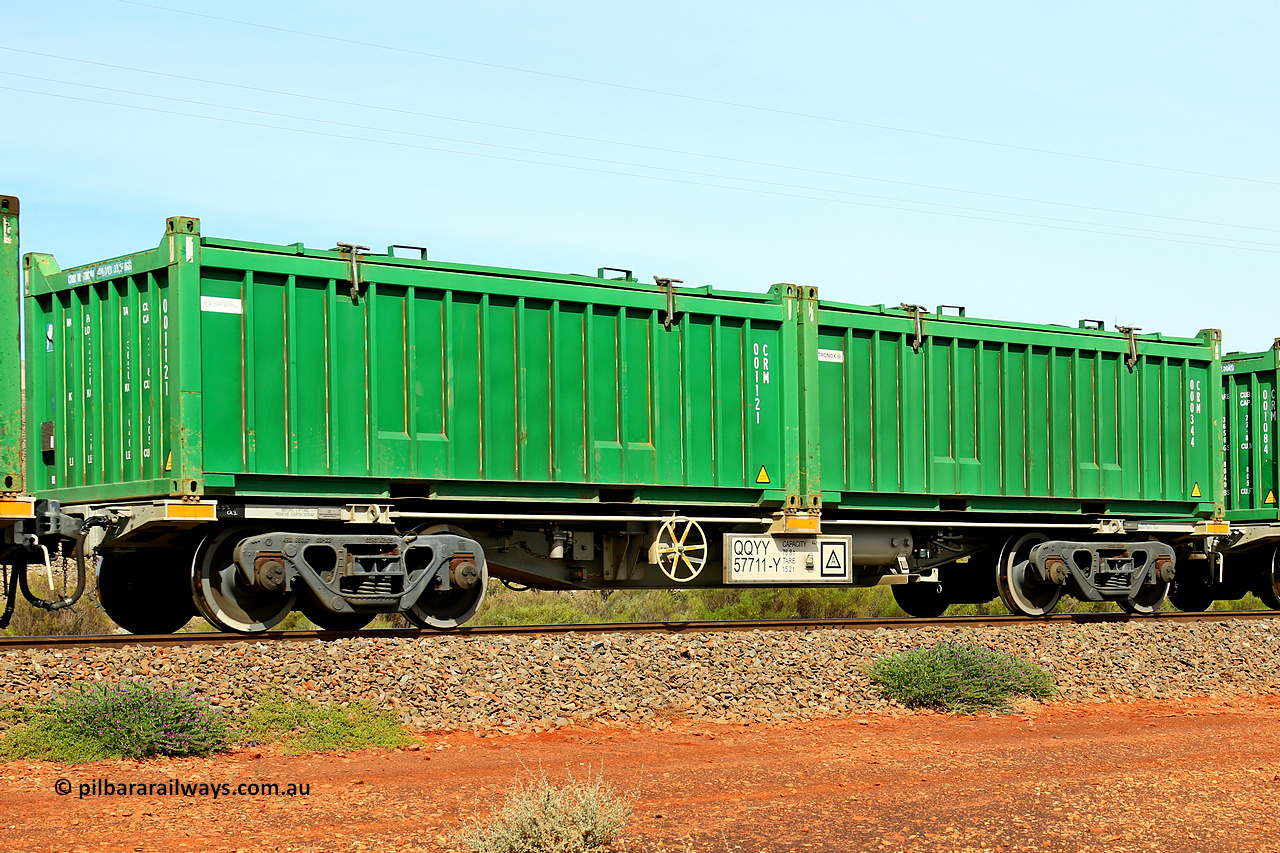 231020 8201
Parkeston, QQYY type 40' container waggon QQYY 57711 one of five hundred ordered by Aurizon and built by CRRC Yangtze Group of China in 2022. In service with two loaded 20' half height hard top 'rotainers' lettered CRM, for Cristal Mining before they were absorbed into Tronox, CRM 000344 with Tronox decal and CRM 001121 with Cristal decal, on Aurizon's Tronox mineral sands train 4UP1 from Ivanhoe / Broken Hill (NSW) to Kwinana (WA). 20th of October 2023.
Keywords: QQYY-type;QQYY57711;CRRC-Yangtze-Group-China;