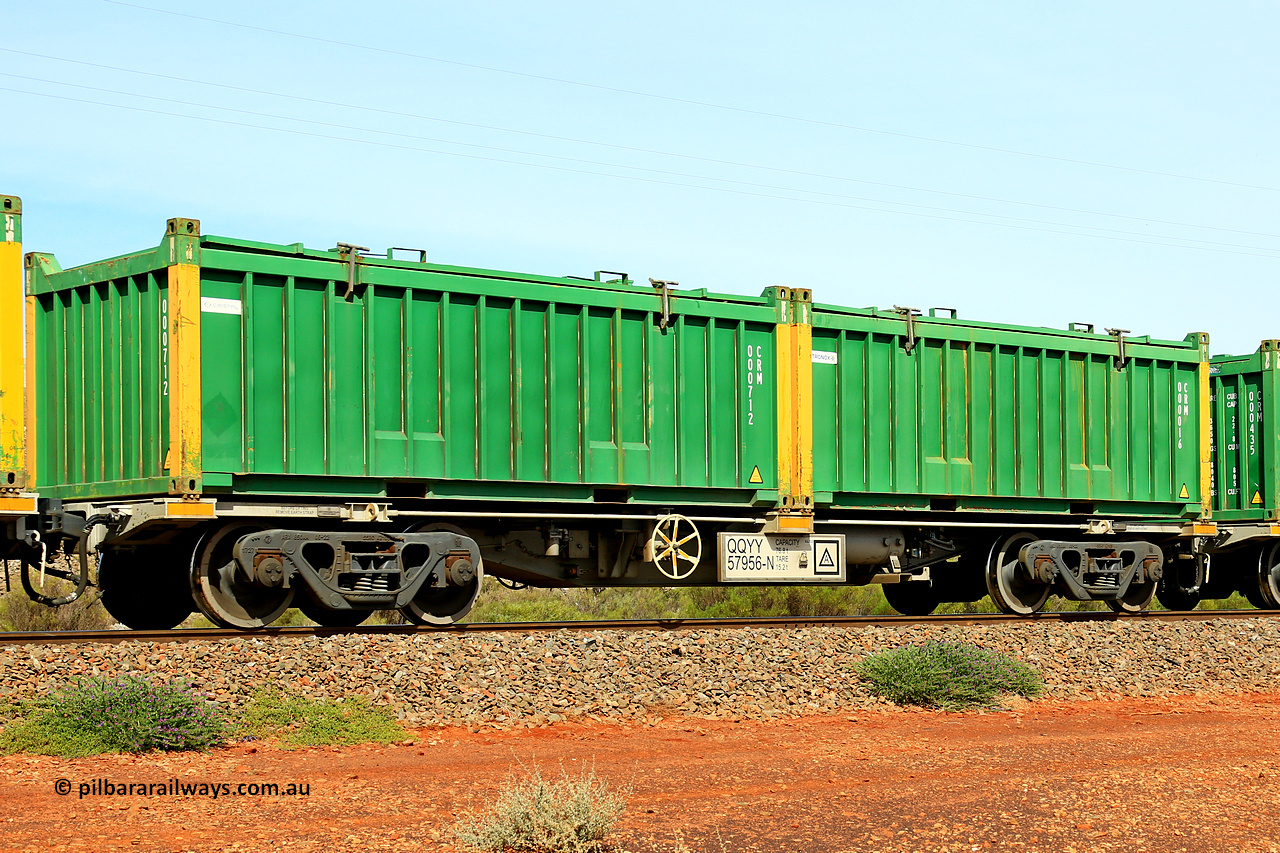 231020 8207
Parkeston, QQYY type 40' container waggon QQYY 57956 one of five hundred ordered by Aurizon and built by CRRC Yangtze Group of China in 2022. In service with two loaded 20' half height hard top 'rotainers' lettered CRM, for Cristal Mining before they were absorbed into Tronox, CRM 000016 with Tronox decal and yellow corner posts and CRM 000712 with Cristal decal and yellow corner posts, on Aurizon's Tronox mineral sands train 4UP1 from Ivanhoe / Broken Hill (NSW) to Kwinana (WA). 20th of October 2023.
Keywords: QQYY-type;QQYY57956;CRRC-Yangtze-Group-China;