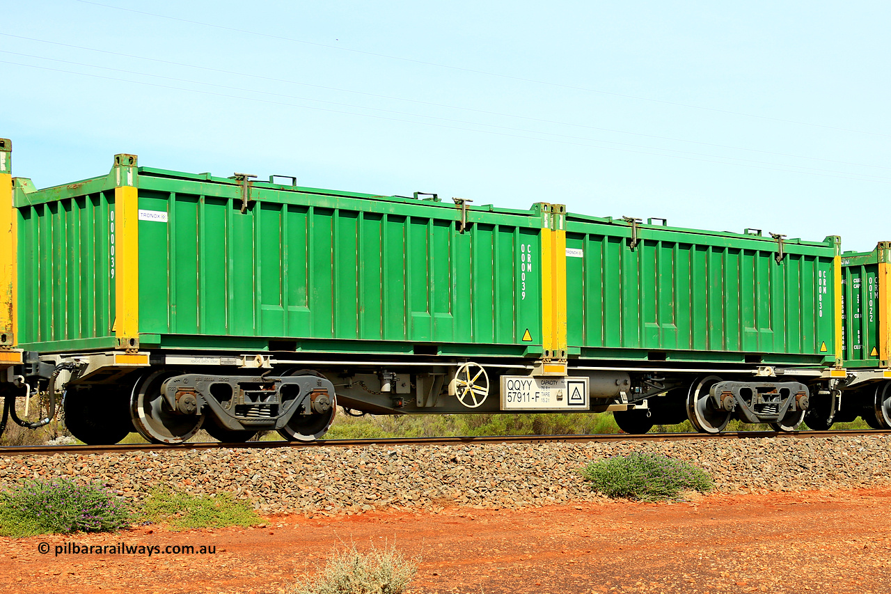 231020 8217
Parkeston, QQYY type 40' container waggon QQYY 57911 one of five hundred ordered by Aurizon and built by CRRC Yangtze Group of China in 2022. In service with two loaded 20' half height hard top 'rotainers' lettered CRM, for Cristal Mining before they were absorbed into Tronox, CRM 000830 with Tronox decal and yellow corner posts and CRM 000039 with Tronox decal and yellow corner posts, on Aurizon's Tronox mineral sands train 4UP1 from Ivanhoe / Broken Hill (NSW) to Kwinana (WA). 20th of October 2023.
Keywords: QQYY-type;QQYY57911;CRRC-Yangtze-Group-China;