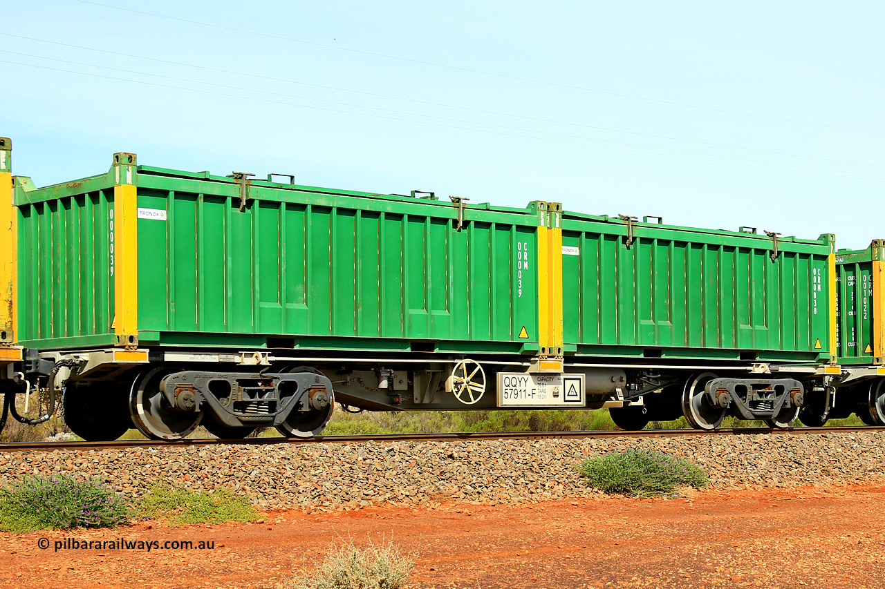 231020 8217
Parkeston, QQYY type 40' container waggon QQYY 57911 one of five hundred ordered by Aurizon and built by CRRC Yangtze Group of China in 2022. In service with two loaded 20' half height hard top 'rotainers' lettered CRM, for Cristal Mining before they were absorbed into Tronox, CRM 000830 with Tronox decal and yellow corner posts and CRM 000039 with Tronox decal and yellow corner posts, on Aurizon's Tronox mineral sands train 4UP1 from Ivanhoe / Broken Hill (NSW) to Kwinana (WA). 20th of October 2023.
Keywords: QQYY-type;QQYY57911;CRRC-Yangtze-Group-China;