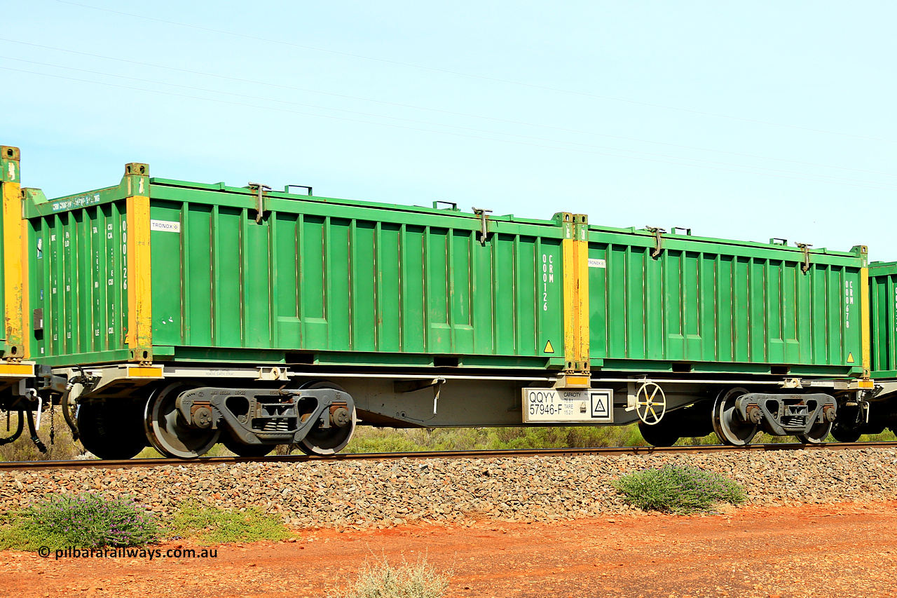 231020 8239
Parkeston, QQYY type 40' container waggon QQYY 57946 one of five hundred ordered by Aurizon and built by CRRC Yangtze Group of China in 2022. In service with two loaded 20' half height hard top 'rotainers' lettered CRM, for Cristal Mining before they were absorbed into Tronox, CRM 000678 with Tronox decal and yellow corner posts and CRM 000126 with Tronox decal and yellow corner posts, on Aurizon's Tronox mineral sands train 4UP1 from Ivanhoe / Broken Hill (NSW) to Kwinana (WA). 20th of October 2023.
Keywords: QQYY-type;QQYY57946;CRRC-Yangtze-Group-China;