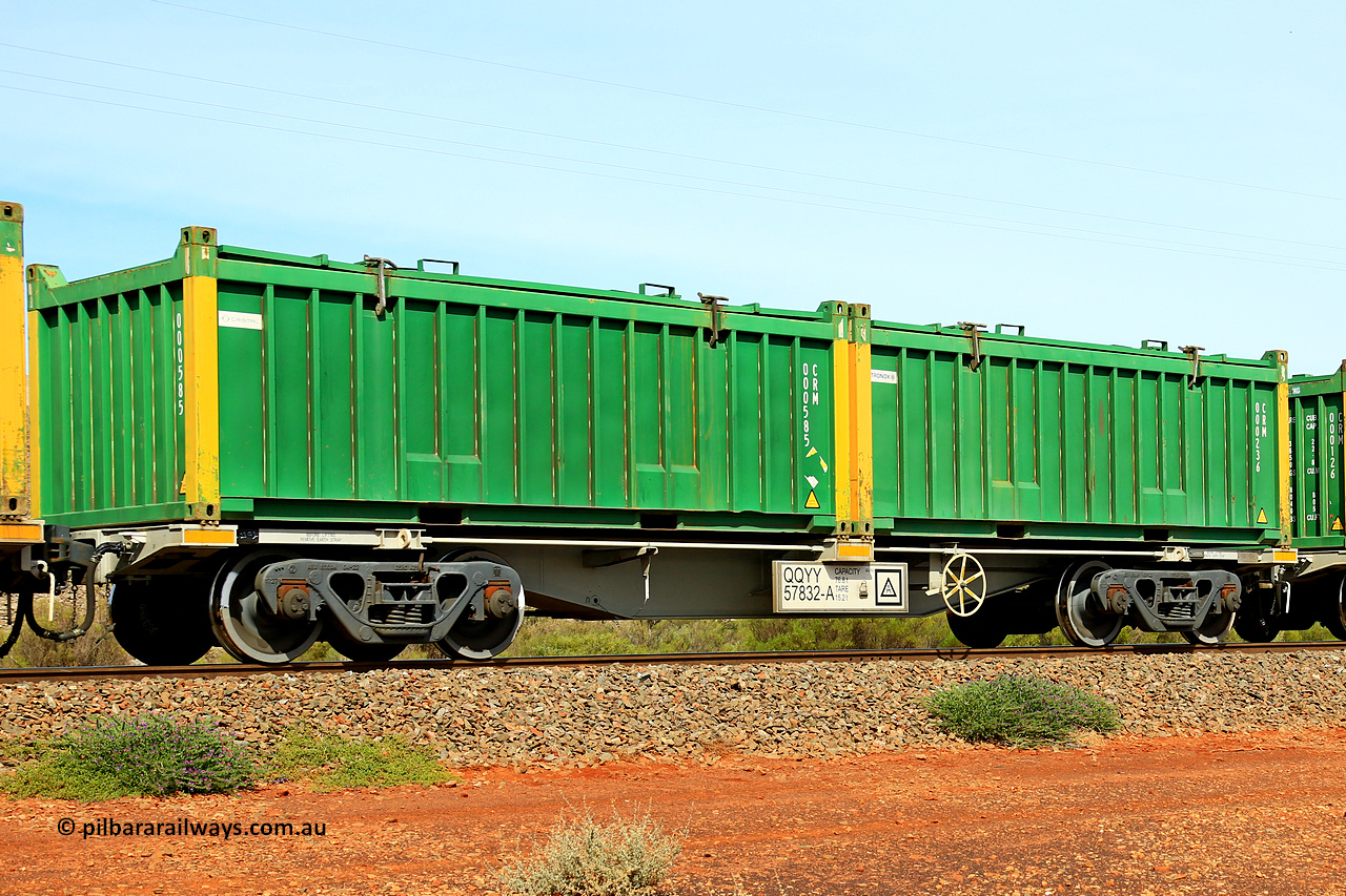 231020 8240
Parkeston, QQYY type 40' container waggon QQYY 57832 one of five hundred ordered by Aurizon and built by CRRC Yangtze Group of China in 2022. In service with two loaded 20' half height hard top 'rotainers' lettered CRM, for Cristal Mining before they were absorbed into Tronox, CRM 000236 with Tronox decal and yellow corner posts and CRM 000585 with Cristal decal and yellow corner posts, on Aurizon's Tronox mineral sands train 4UP1 from Ivanhoe / Broken Hill (NSW) to Kwinana (WA). 20th of October 2023.
Keywords: QQYY-type;QQYY57832;CRRC-Yangtze-Group-China;