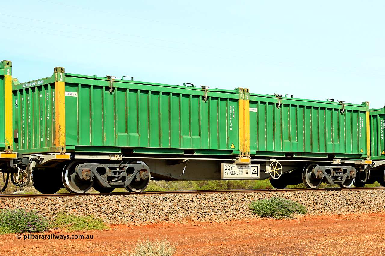 231020 8241
Parkeston, QQYY type 40' container waggon QQYY 57900 one of five hundred ordered by Aurizon and built by CRRC Yangtze Group of China in 2022. In service with two loaded 20' half height hard top 'rotainers' lettered CRM, for Cristal Mining before they were absorbed into Tronox, CRM 000554 with Tronox decal and yellow corner posts and CRM 001736 with Tronox decal and yellow corner posts, on Aurizon's Tronox mineral sands train 4UP1 from Ivanhoe / Broken Hill (NSW) to Kwinana (WA). 20th of October 2023.
Keywords: QQYY-type;QQYY57900;CRRC-Yangtze-Group-China;