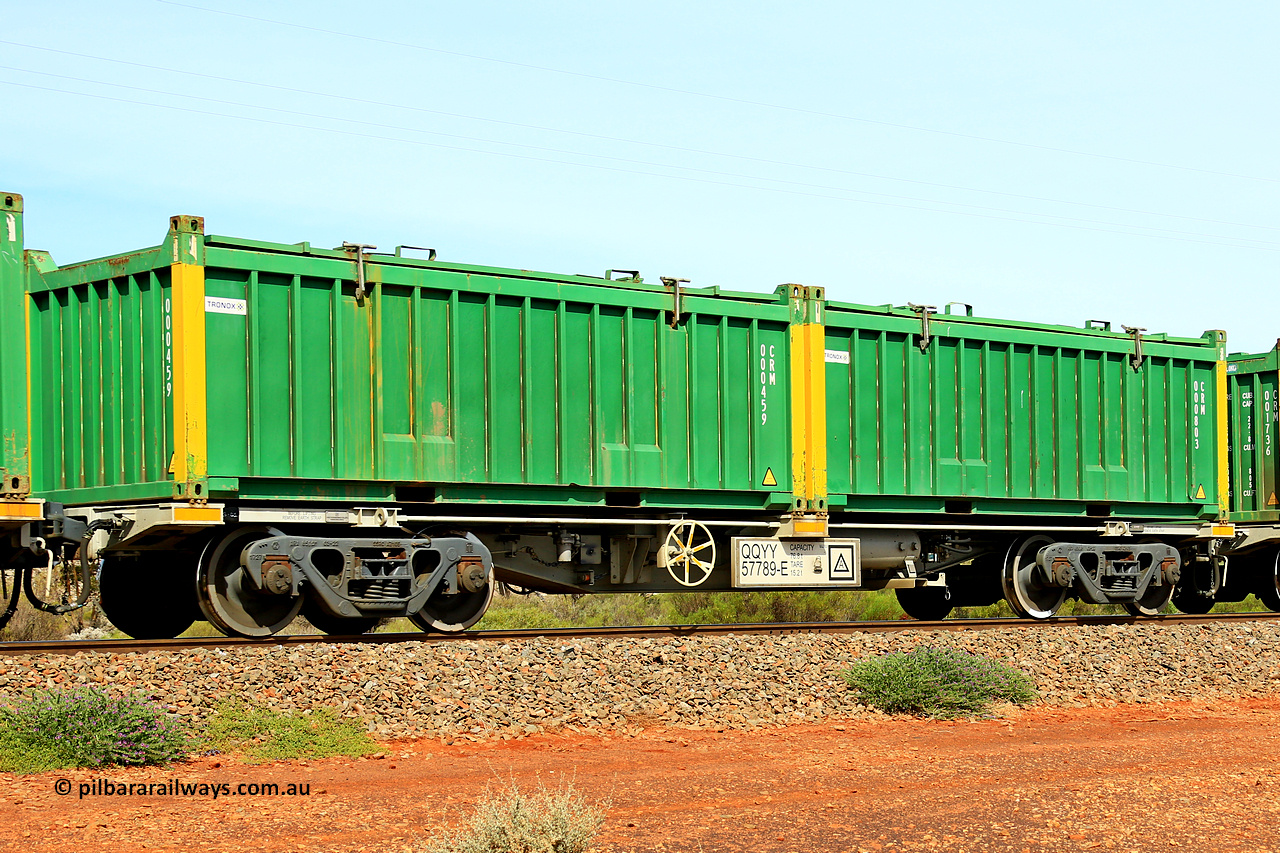 231020 8242
Parkeston, QQYY type 40' container waggon QQYY 57789 one of five hundred ordered by Aurizon and built by CRRC Yangtze Group of China in 2022. In service with two loaded 20' half height hard top 'rotainers' lettered CRM, for Cristal Mining before they were absorbed into Tronox, CRM 000803 with Tronox decal and yellow corner posts and CRM 000459 with Tronox decal and yellow corner posts, on Aurizon's Tronox mineral sands train 4UP1 from Ivanhoe / Broken Hill (NSW) to Kwinana (WA). 20th of October 2023.
Keywords: QQYY-type;QQYY57789;CRRC-Yangtze-Group-China;
