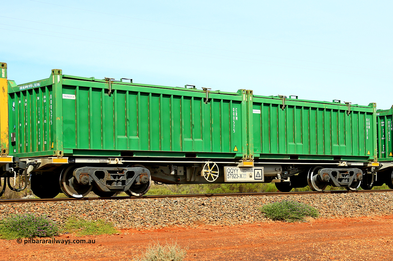 231020 8245
Parkeston, QQYY type 40' container waggon QQYY 57923 one of five hundred ordered by Aurizon and built by CRRC Yangtze Group of China in 2022. In service with two loaded 20' half height hard top 'rotainers' lettered CRM, for Cristal Mining before they were absorbed into Tronox, CRM 000878 with Tronox decal and CRM 000575 with Tronox decal, on Aurizon's Tronox mineral sands train 4UP1 from Ivanhoe / Broken Hill (NSW) to Kwinana (WA). 20th of October 2023.
Keywords: QQYY-type;QQYY57923;CRRC-Yangtze-Group-China;
