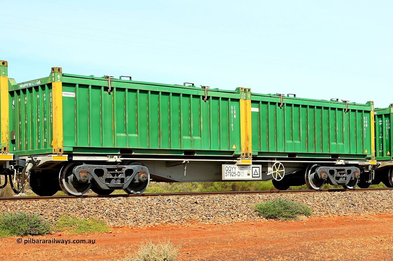 231020 8246
Parkeston, QQYY type 40' container waggon QQYY 57925 one of five hundred ordered by Aurizon and built by CRRC Yangtze Group of China in 2022. In service with two loaded 20' half height hard top 'rotainers' lettered CRM, for Cristal Mining before they were absorbed into Tronox, CRM 000633 with Cristal decal and yellow corner posts and CRM 001163 with Tronox decal and yellow corner posts, on Aurizon's Tronox mineral sands train 4UP1 from Ivanhoe / Broken Hill (NSW) to Kwinana (WA). 20th of October 2023.
Keywords: QQYY-type;QQYY57925;CRRC-Yangtze-Group-China;