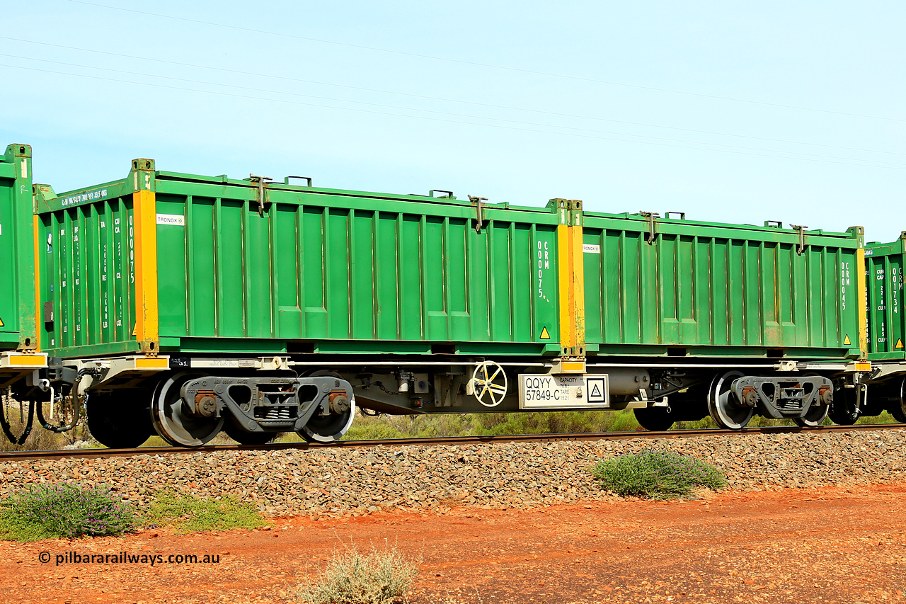 231020 8249
Parkeston, QQYY type 40' container waggon QQYY 57849 one of five hundred ordered by Aurizon and built by CRRC Yangtze Group of China in 2022. In service with two loaded 20' half height hard top 'rotainers' lettered CRM, for Cristal Mining before they were absorbed into Tronox, CRM 000045 with Tronox decal and yellow corner posts and CRM 000075 with Tronox decals and yellow corner posts, on Aurizon's Tronox mineral sands train 4UP1 from Ivanhoe / Broken Hill (NSW) to Kwinana (WA). 20th of October 2023.
Keywords: QQYY-type;QQYY57849;CRRC-Yangtze-Group-China;