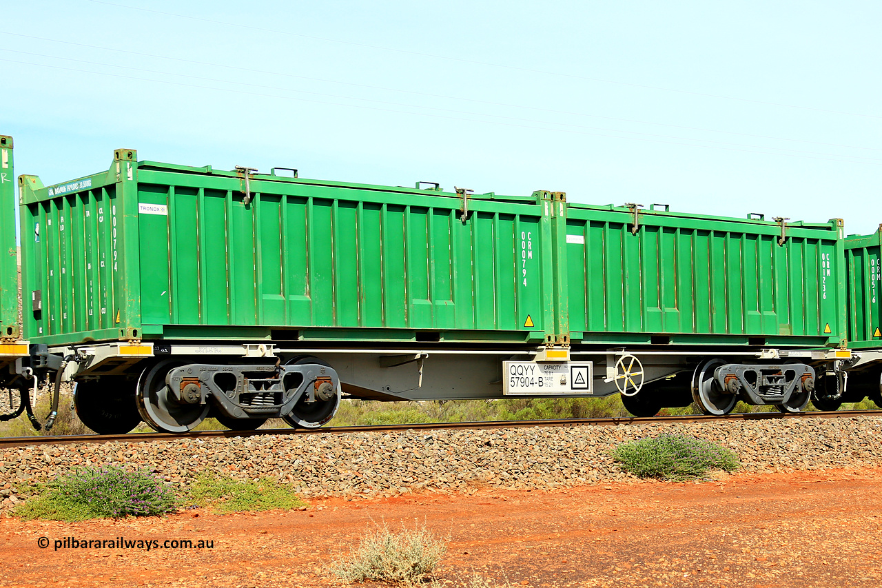 231020 8252
Parkeston, QQYY type 40' container waggon QQYY 57904 one of five hundred ordered by Aurizon and built by CRRC Yangtze Group of China in 2022. In service with two loaded 20' half height hard top 'rotainers' lettered CRM, for Cristal Mining before they were absorbed into Tronox, CRM 001236 with Cristal decal and CRM 000794 with Tronox decal, on Aurizon's Tronox mineral sands train 4UP1 from Ivanhoe / Broken Hill (NSW) to Kwinana (WA). 20th of October 2023.
Keywords: QQYY-type;QQYY57904;CRRC-Yangtze-Group-China;
