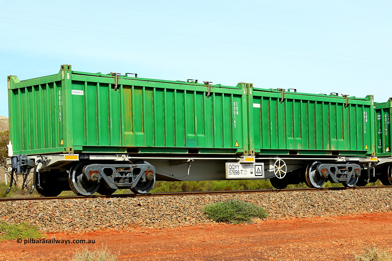 231020 8256
Parkeston, QQYY type 40' container waggon QQYY 57698 one of five hundred ordered by Aurizon and built by CRRC Yangtze Group of China in 2022. In service with two loaded 20' half height hard top 'rotainers' lettered CRM, for Cristal Mining before they were absorbed into Tronox, CRM 001126 with Cristal decal and CRM 000165 with Tronox decal, on Aurizon's Tronox mineral sands train 4UP1 from Ivanhoe / Broken Hill (NSW) to Kwinana (WA). 20th of October 2023.
Keywords: QQYY-type;QQYY57698;CRRC-Yangtze-Group-China;