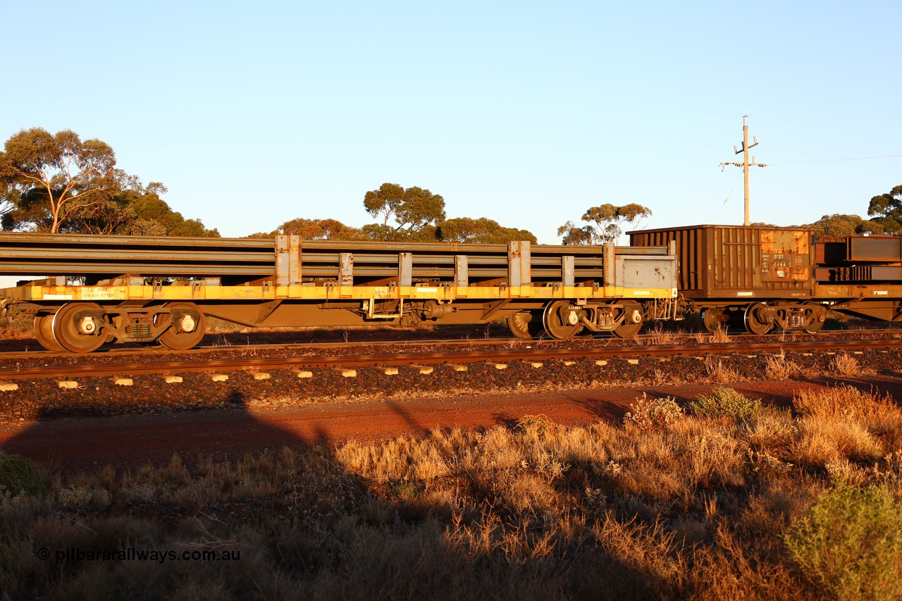 160522 2025
Parkeston, 5MP2 steel train, one of the bar coupled pair of waggons making up RKAF type 2-pack rail transport waggon RKAF 4 for a length of 29.8 metres loaded with new rail, these 'pairs' are rebuilt from a pair of RKJX type waggons. The RKJX were rebuilds from V/Line VOBX type waggons.
Keywords: RKAF-type;RKAF4;Victorian-Railways-Newport-WS;ELX-type;VOBX-type;VOEX-type;VKEX-type;RKEX-type;RKJX-type;