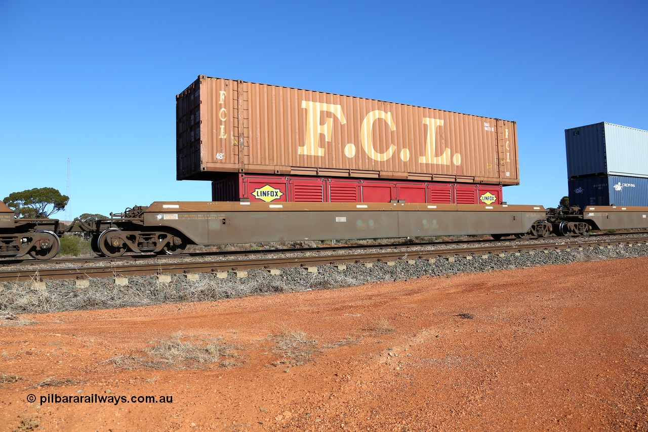 160522 2099
Parkeston, 6MP4 intermodal train, platform 3 of 5-pack RRRY 7006 well waggon set, one of nineteen built in China at Zhuzhou Rolling Stock Works for Goninan in 2005, Linfox LSDU half height side door container and FCL FBGU 480273 48' container.
Keywords: RRRY-type;RRRY7006;CSR-Zhuzhou-Rolling-Stock-Works-China;