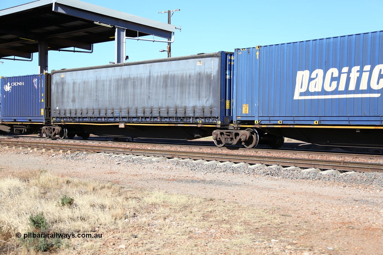 160522 2143
Parkeston, 6MP4 intermodal train, platform 2 of 5 pack RRGY 7123 5 pack articulated skel waggon set, originally built as RRBY by AN Rail at Islington Workshops SA 1996-97, recoded when decks rebuilt longer, 48' deck with a Pacific National 48' curtainsider container PNXM 4543.
Keywords: RRGY-type;RRGY7123;RRBY-type;AN-Islington-WS;