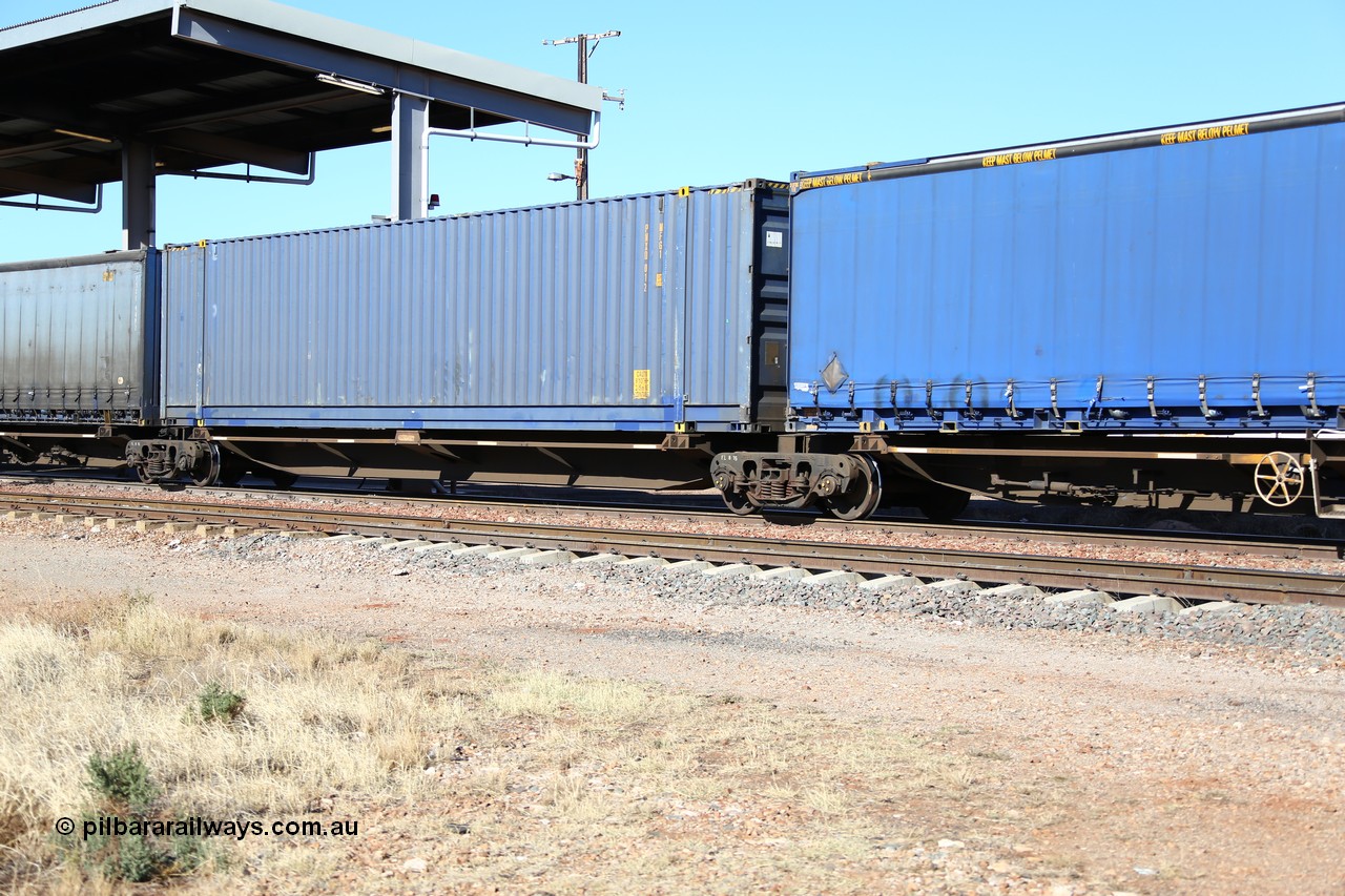 160522 2146
Parkeston, 6MP4 intermodal train, platform 2 of 5 on RRQY 7323 5 pack articulated skel waggon set built by Qiqihar Rollingstock Works China in 2005 for Pacific National, with a 48' container of the owner PNXD 012.
Keywords: RRQY-type;RRQY7323;Qiqihar-Rollingstock-Works-China;