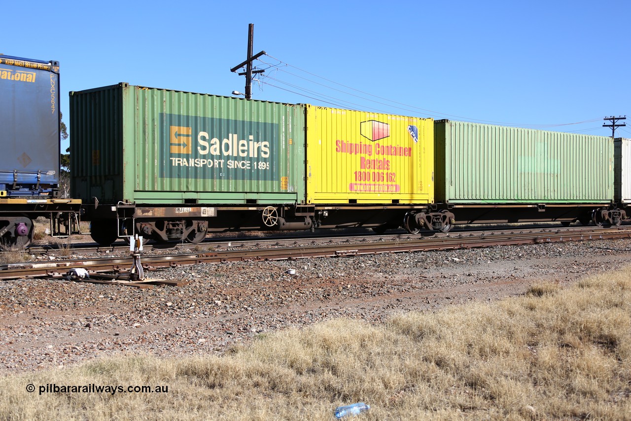 160522 2173
Parkeston, 6MP4 intermodal train, RQLY 4 platform 5 of 5-pack articulated skel waggon set, 1 of 8 built by AN Rail Islington Workshops in 1987 as AQJY, Shipping Container Rentals 20' box FUKU 380899 and Sadleirs 20' box RCSB 5088.
Keywords: RQJY-type;RQJY4;AN-Islington-WS;AQJY-type;