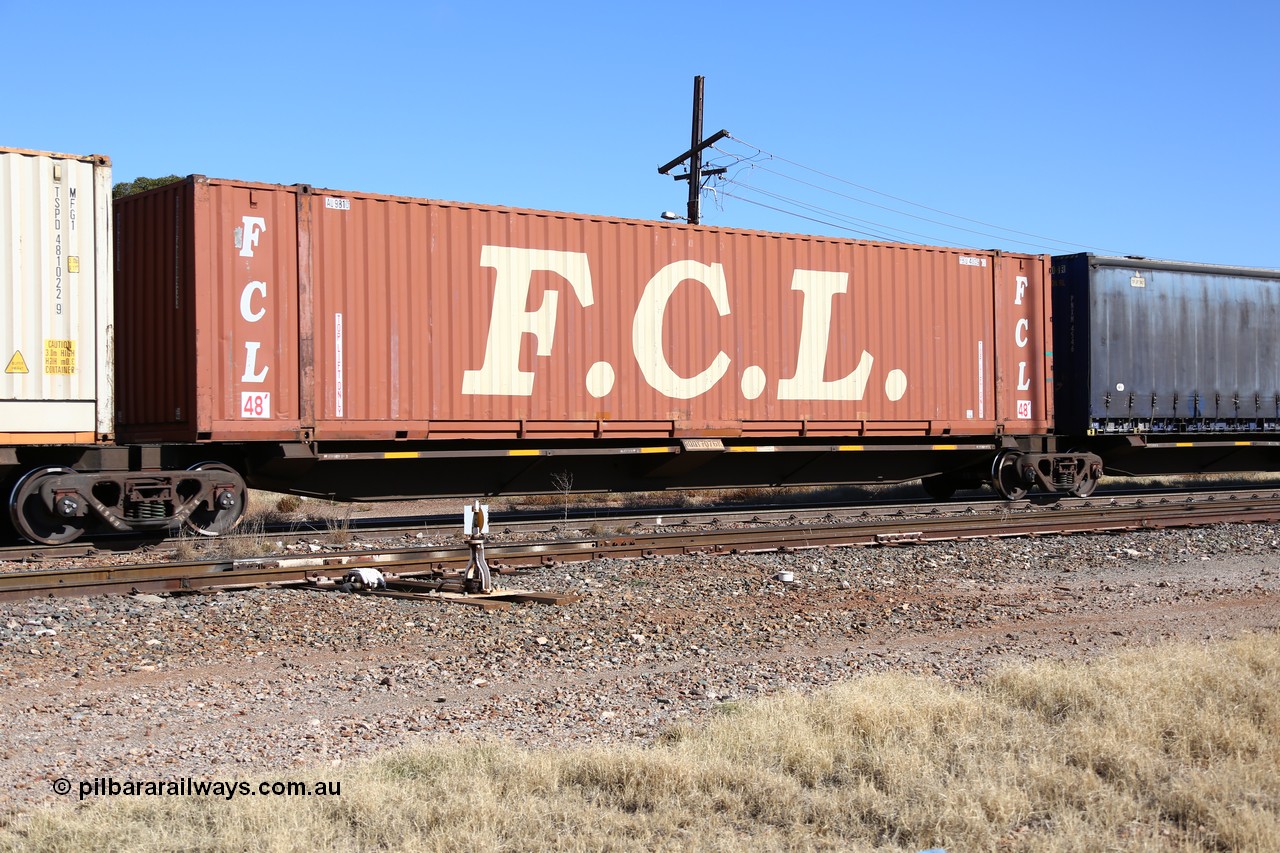 160522 2177
Parkeston, 6MP4 intermodal train, RQQY 7076 platform 3 of 5-pack articulated skel waggon set, 1 of 17 built by Qld Rail at Ipswich Workshops in 1995, FCL 48' container FBGU 480093.
Keywords: RQQY-type;RQQY7076;Qld-Rail-Ipswich-WS;