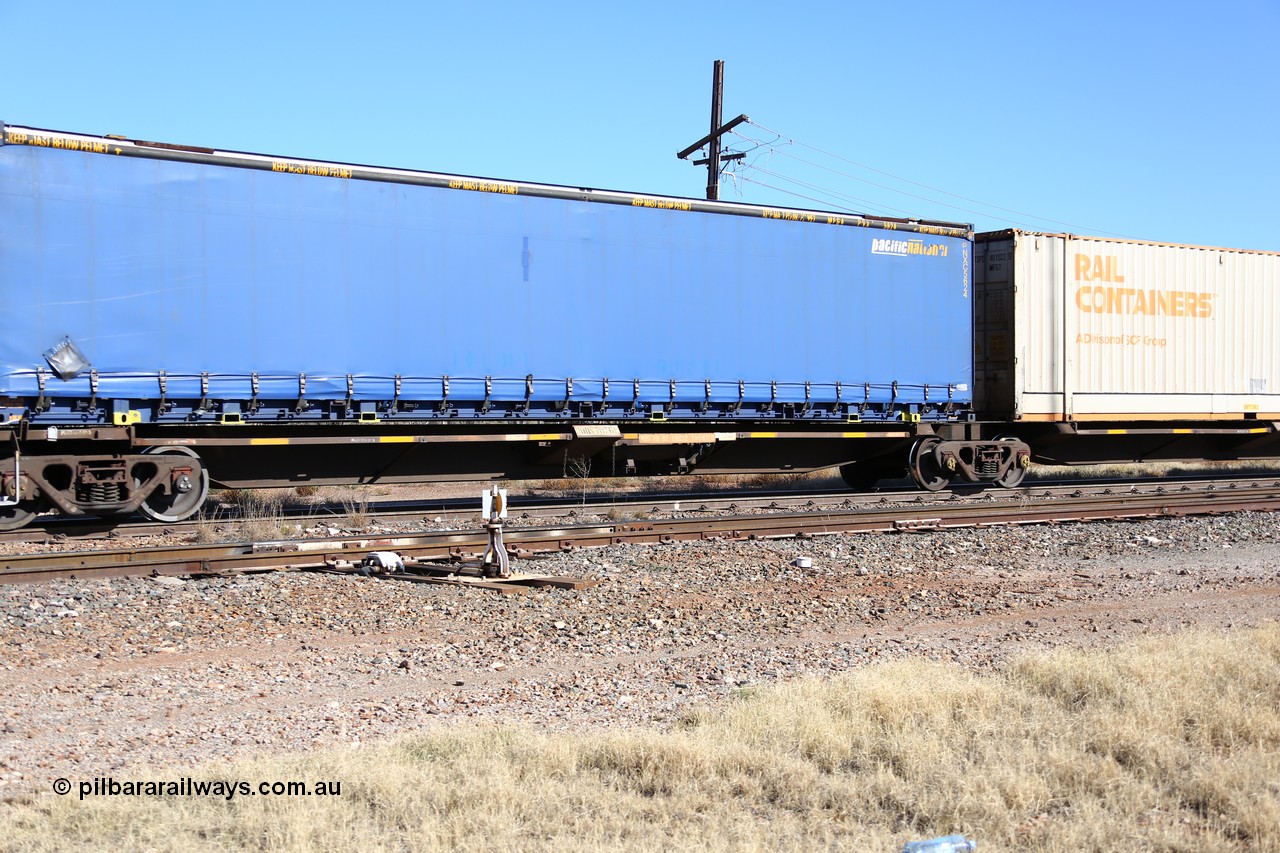 160522 2179
Parkeston, 6MP4 intermodal train, RQQY 7076 platform 5 of 5-pack articulated skel waggon set, 1 of 17 built by Qld Rail at Ipswich Workshops in 1995, 48' Pacific National curtainsider PNXC 5624.
Keywords: RQQY-type;RQQY7076;Qld-Rail-Ipswich-WS;