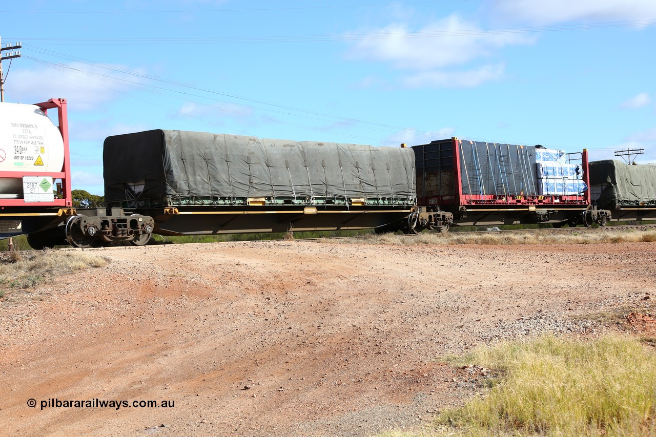 160522 2346
Parkeston, 7MP7 priority service train, platform 4 of 5-pack articulated skel waggon set, Qiqihar Rollingstock Works China built RRQY 5816, 40' flatrack with tarped load.
Keywords: RRQY-type;RRQY8516;Qiqihar-Rollingstock-Works-China;