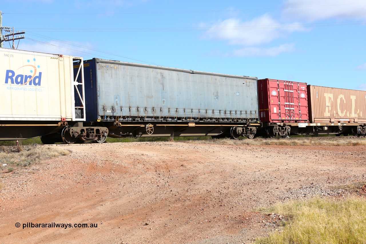 160522 2361
Parkeston, 7MP7 priority service train, platform 1 of 5-pack articulated skel waggon set, Qiqihar Rollingstock Works China built RRQY 8408, Pacific National 48' curtainsider PNXC 013.
Keywords: RRQY-type;RRQY8408;Qiqihar-Rollingstock-Works-China;