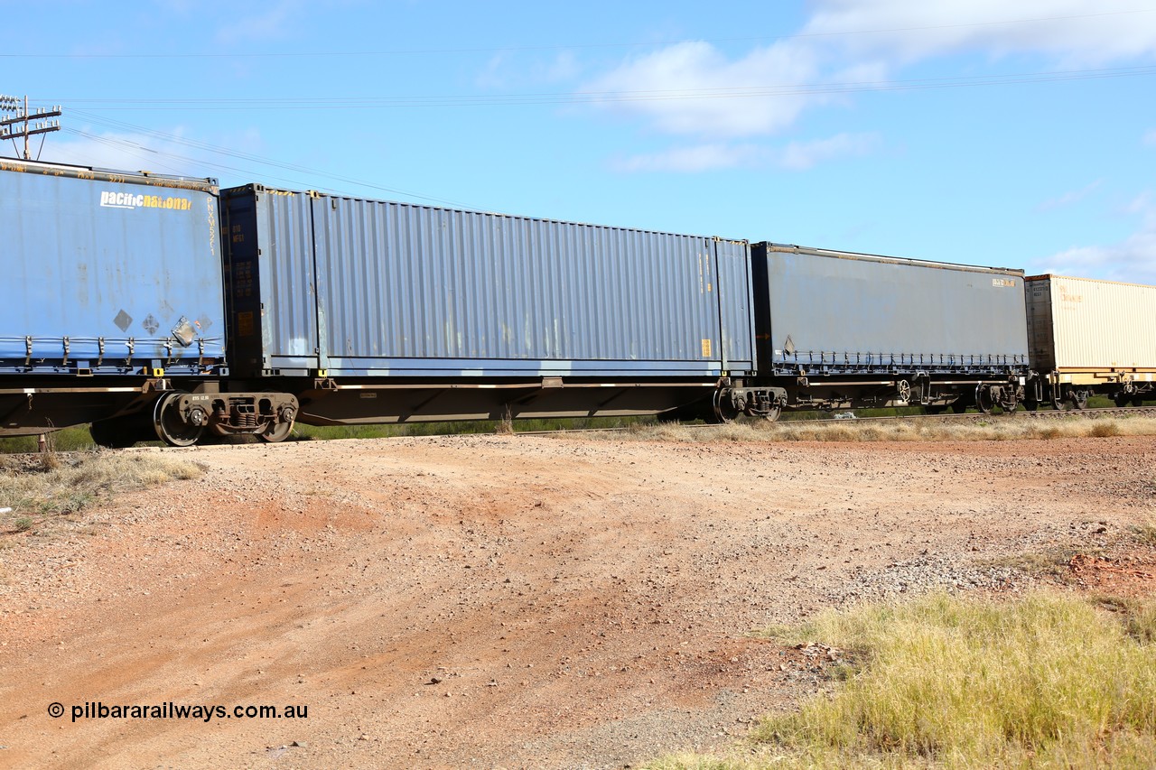 160522 2397
Parkeston, 7MP7 priority service train, platform 2 of 5 on RRQY 8344 5-pack articulated skeletal waggon set the last of a batch of 41 built by Qiqihar Rollingstock Works China in 2005 for Pacific National, with a 48' Pacific National box PNXD 010.
Keywords: RRQY-type;RRQY8344;Qiqihar-Rollingstock-Works-China;