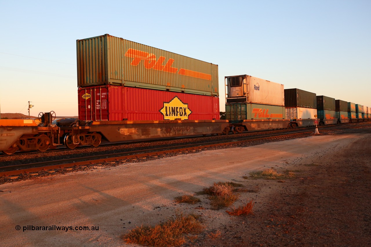 160523 2726
Parkeston, 1PM5 intermodal train, RRZY 7022 one of twenty six 5-pack well waggon sets built by Goninan in 1995-96 for National Rail, with mostly 48' containers.
Keywords: RRZY-type;RRZY7022;Goninan-NSW;