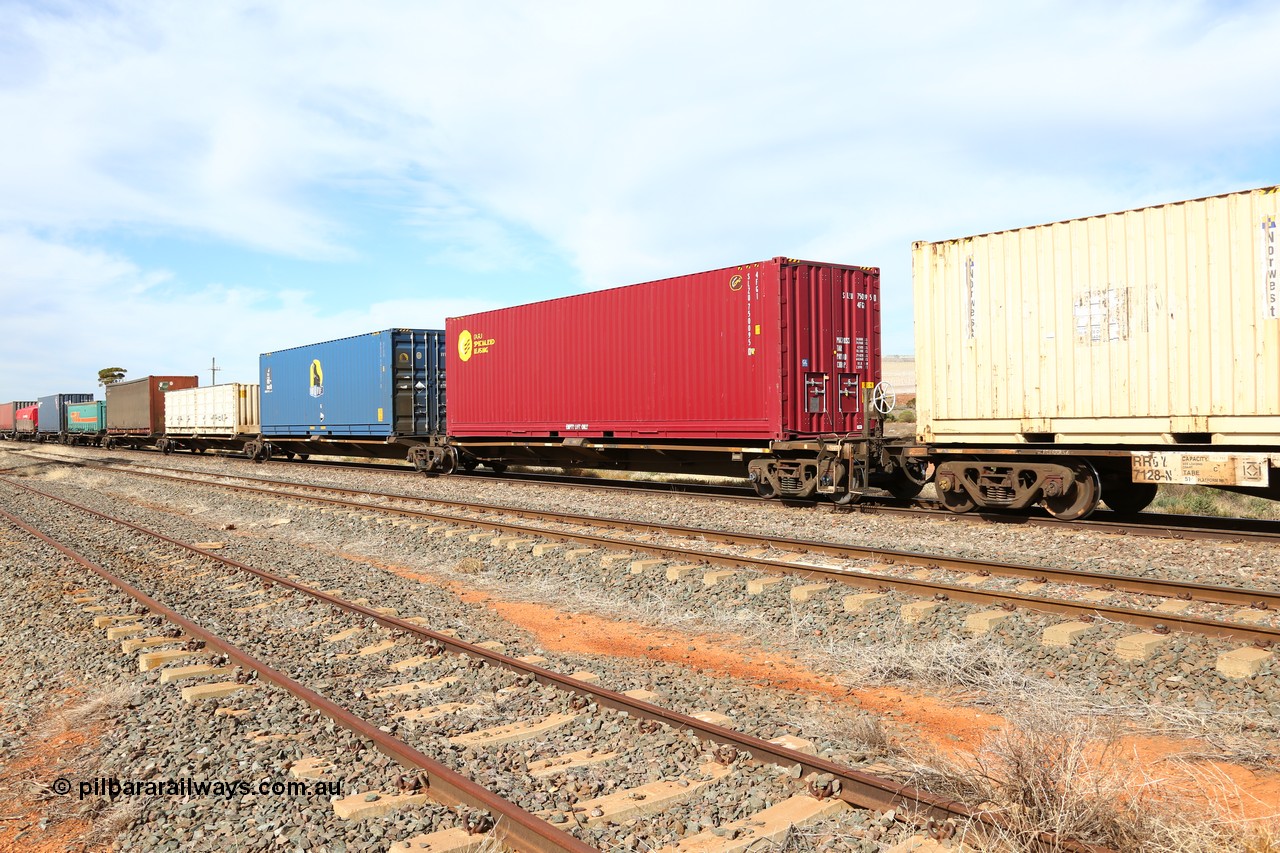 160523 2942
Parkeston, 7SP3 intermodal train, RQQY 7003 5-pack articulated skel waggon built as a 'one off' my AN Rail Islington Workshops in 1994 as REQY with electric power connections, seen here with 5 different types of container.
Keywords: RQQY-type;RQQY7003;AN-Islington-WS;REQY-type;