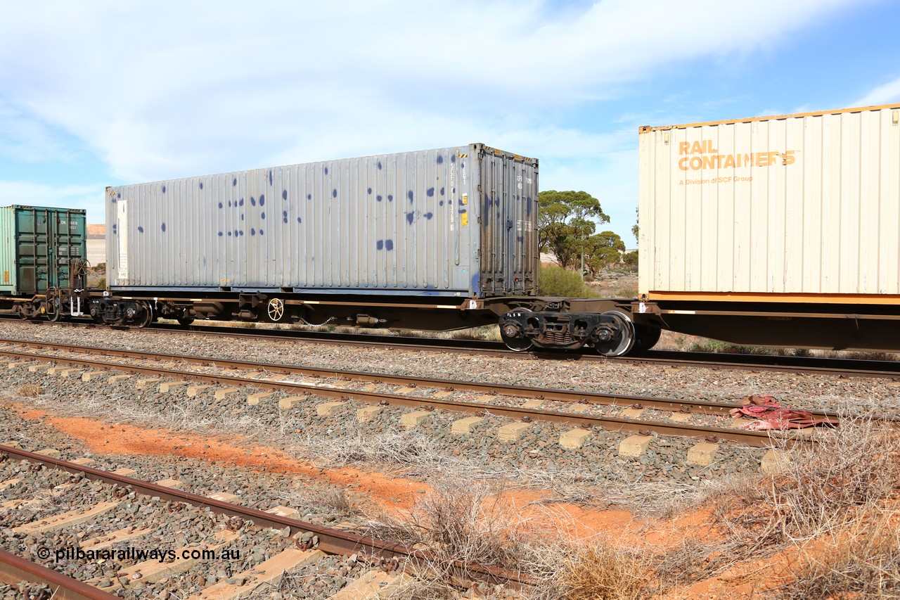 160523 2953
Parkeston, 7SP3 intermodal train, RRQY 8307 platform 5 of 5-pack articulated skel waggon, one of forty one sets built by Qiqihar Rollingstock Works China in 2006 loaded with a SCF 40' box SCFU 471329.
Keywords: RRQY-type;RRQY830P;Qiqihar-Rollingstock-Works-China;