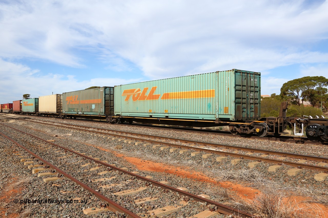 160523 2954
Parkeston, 7SP3 intermodal train, RRYY 34 5-pack articulated low profile skel waggon set, one of fifty two such sets built by Bradken Rail Braemar from a Williams-Worley design, based on the TNT TRAY type for moving automotive carrying containers, three 48' Toll and two 40' boxes.
Keywords: RRYY-type;RRYY34;Williams-Worley;Bradken-NSW;