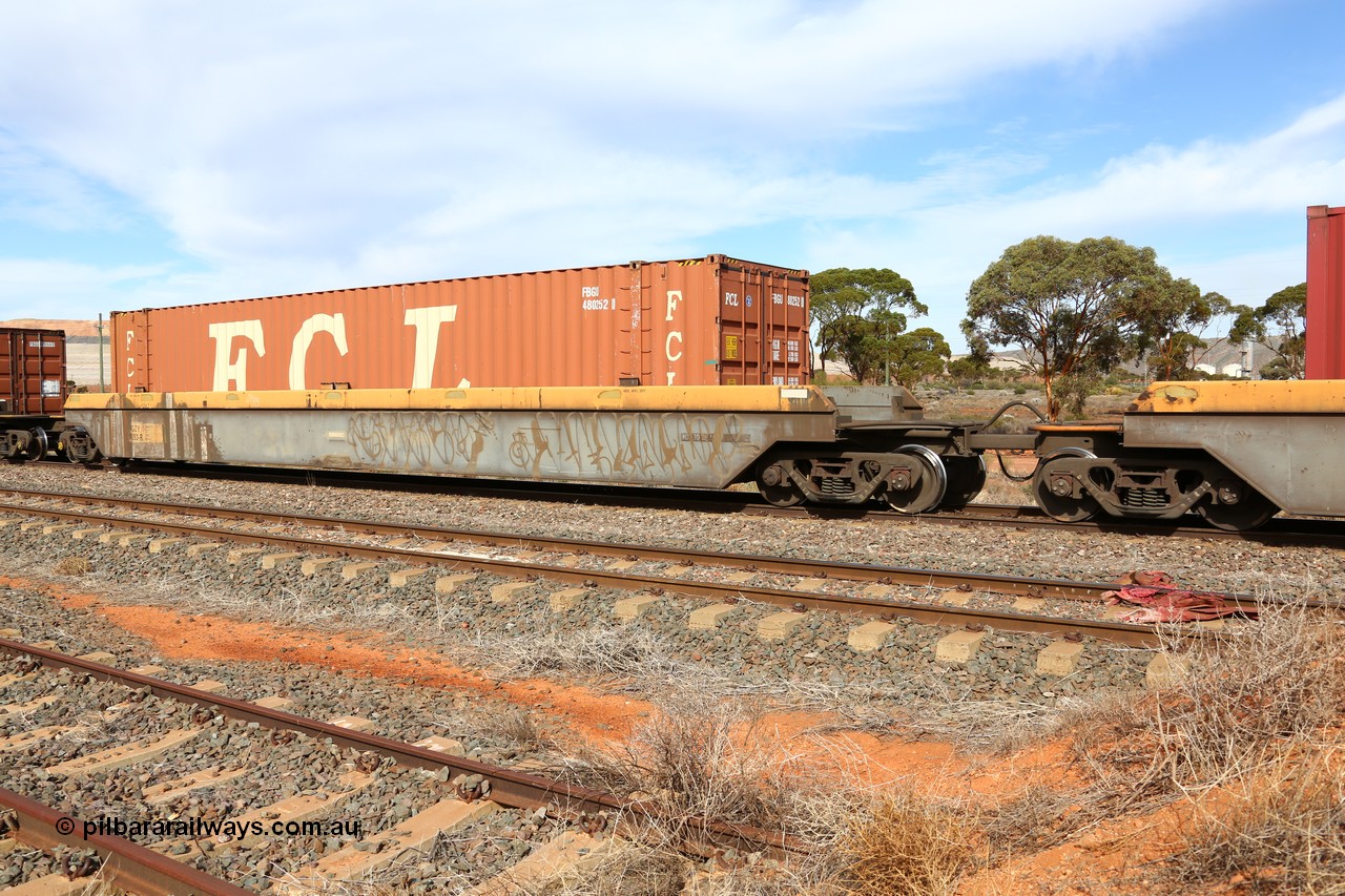 160523 2962
Parkeston, 7SP3 intermodal train, RQZY 7053 platform 4 of five unit bar coupled well container waggon set, one of thirty two Goninan built well waggon sets from 1995-96, loaded with FCL 48' container FBGU 480252.
Keywords: RQZY-type;RQZY7053;Goninan-NSW;