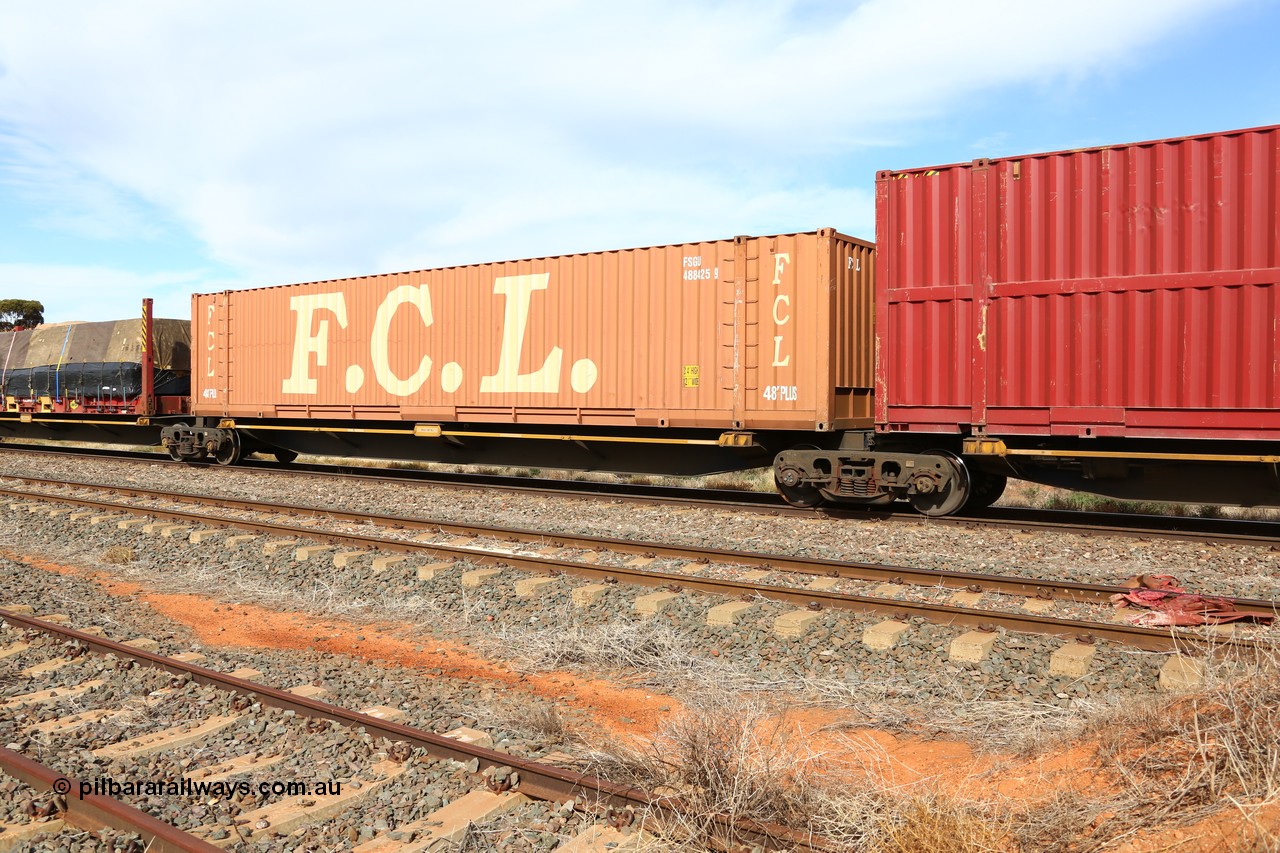 160523 2968
Parkeston, 7SP3 intermodal train, RRQY 8519 platform 2 of 5-pack articulated skel waggon set, built by Qiqihar Rollingstock Works, China in 2015, loaded with a 48' FCL container FSGU 488425.
Keywords: RRQY-type;RRQY8519;Qiqihar-Rollingstock-Works-China;