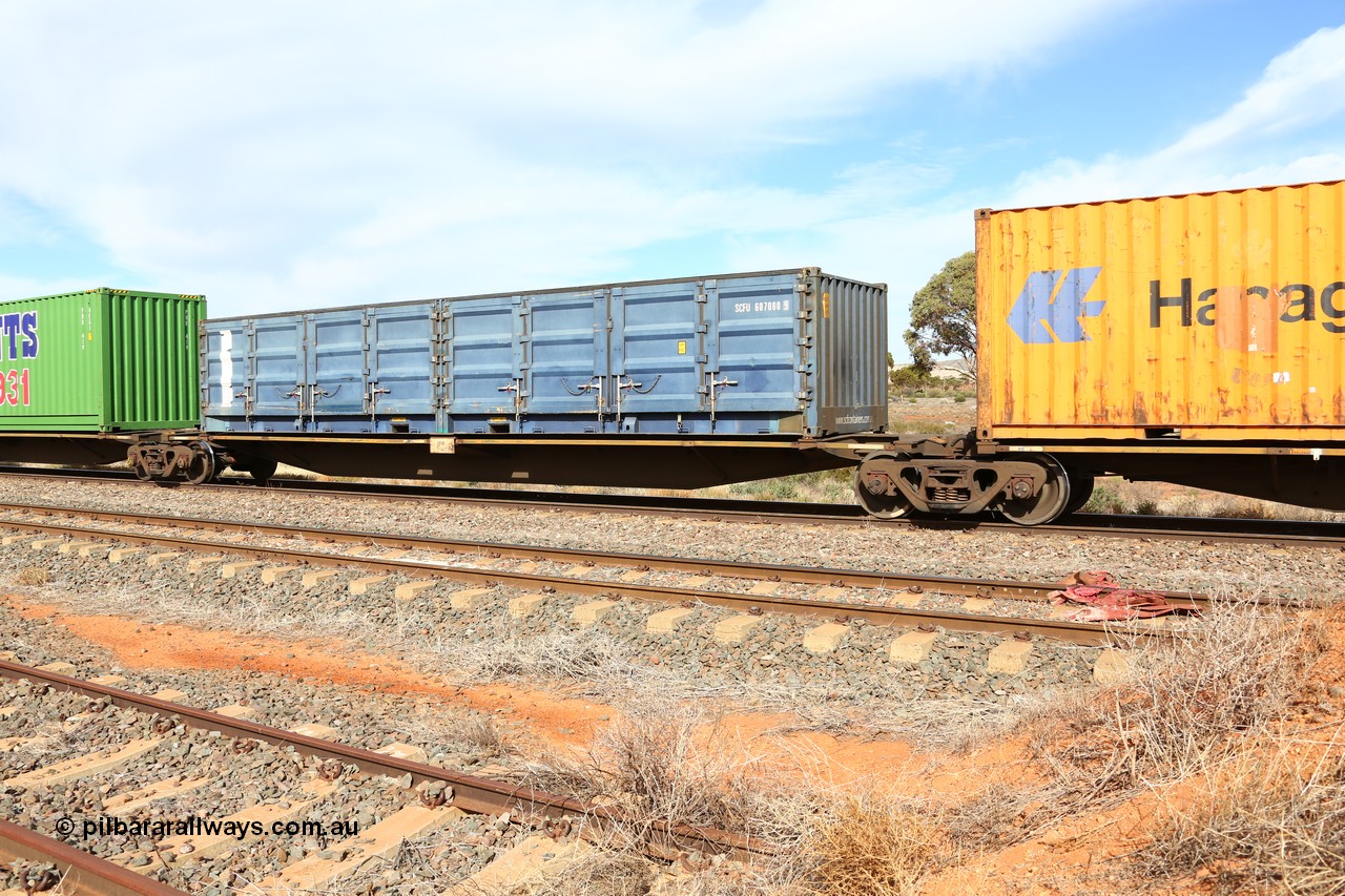 160523 2976
Parkeston, 7SP3 intermodal train, RRGY 7142 platform 4, RRGY type is a 5-pack articulated skeletal container waggon, one of fifty originally built by AN Rail Islington Workshops in 1996-97 as type RRBY, later rebuilt with 48' intermediate decks and recoded to RRGY. Loaded with an SCF 40' half height side door container SCFU 607080 [9].
Keywords: RRGY-type;RRGY7142;AN-Islington-WS;RRBY-type;