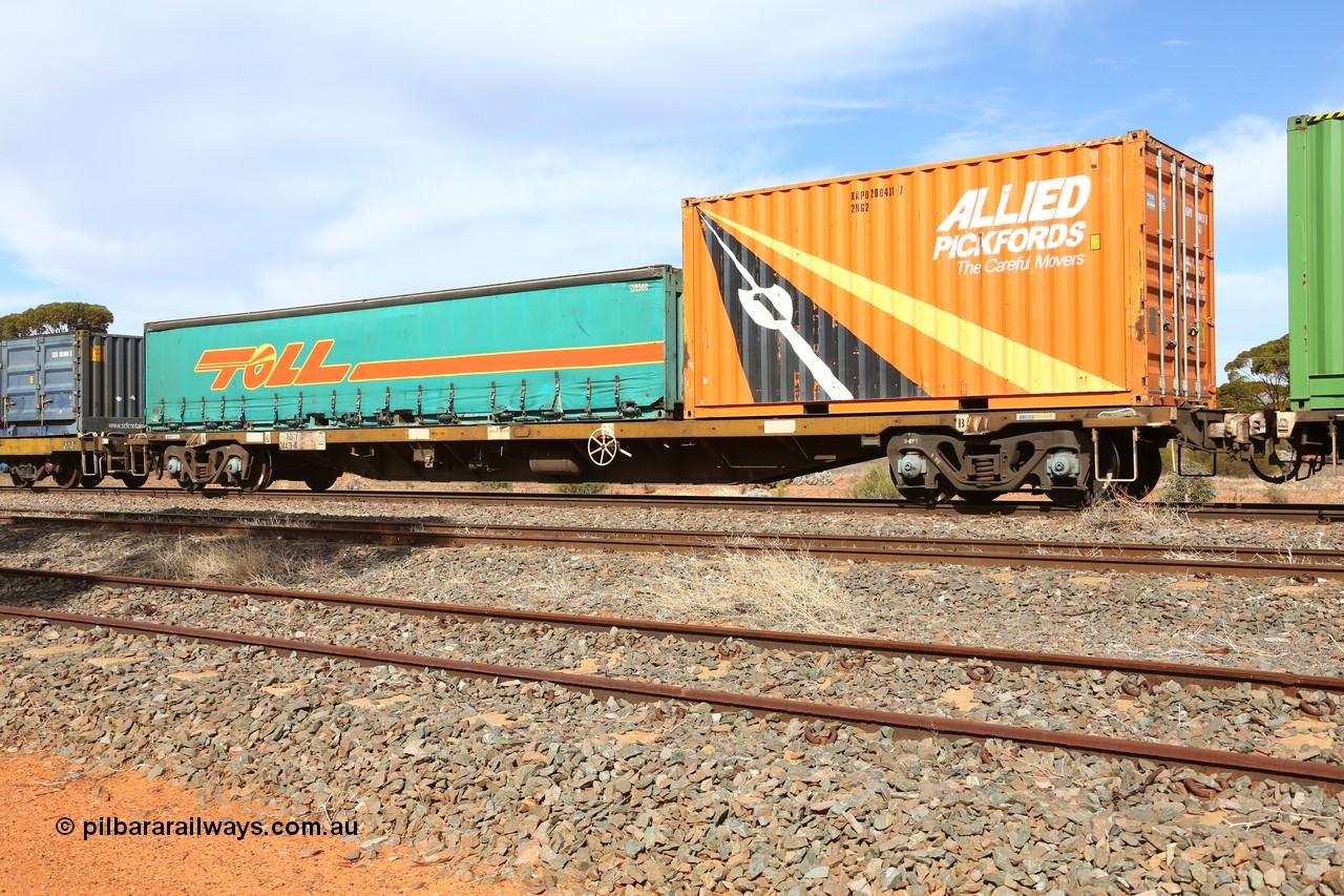 160523 2992
Parkeston, 7SP3 intermodal train, RQGY 34478 63' container waggon, originally built in a batch of one hundred by Tulloch Ltd NSW between 1974 and 75 as an OCY type, recoded to NQOY then NQSY. Loaded with an Allied Pickfords 20' 2NG2 type box KAPU 200431 [7] and a 40' Toll half height curtainsider DS 568.
Keywords: RQGY-type;RQGY34478;Tulloch-Ltd-NSW;OCY-type;NQOY-type;NQSY-type;