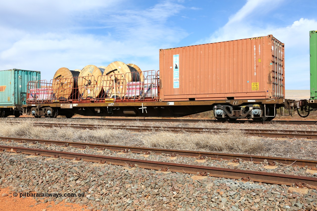 160523 3009
Parkeston, 7SP3 intermodal train, RQGY 34474 63' container waggon, originally built in a batch of one hundred by Tulloch Ltd NSW between 1974 and 75 as an OCY type, recoded to NQOY then NQSY. 
Keywords: RQGY-type;RQGY34474;Tulloch-Ltd-NSW;OCY-type;NQOY-type;NQGY-type;