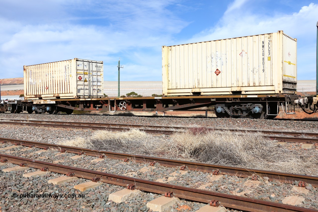 160523 3012
Parkeston, 7SP3 intermodal train, RQKY 2693 container waggon, built by Perry Engineering SA in 1974 in a batch of seventy four RM type motor vehicle flat waggons, converted to AQPY container waggon, then fitted with aligned bogies and recoded to AQMP. April 1994 to RQKY. Loaded with two Norwest Shipping 20' 2CG9 type containers NWSU 8019 and NWSU 8032.
Keywords: RQKY-type;RQKY2693;Perry-Engineering-SA;RM-type;AQMP-type;