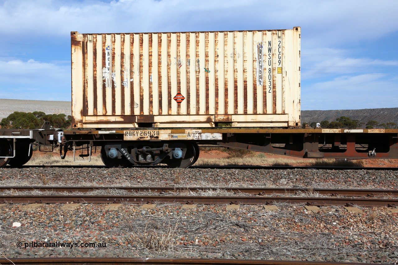 160523 3013
Parkeston, 7SP3 intermodal train, RQKY 2693 container waggon, built by Perry Engineering SA in 1974 in a batch of seventy four RM type motor vehicle flat waggons, converted to AQPY container waggon, then fitted with aligned bogies and recoded to AQMP. April 1994 to RQKY. Side view of code board and aligned bogie with Norwest Shipping 20' 2CG9 type container NWSU 8032.
Keywords: RQKY-type;RQKY2693;Perry-Engineering-SA;RM-type;AQMP-type;