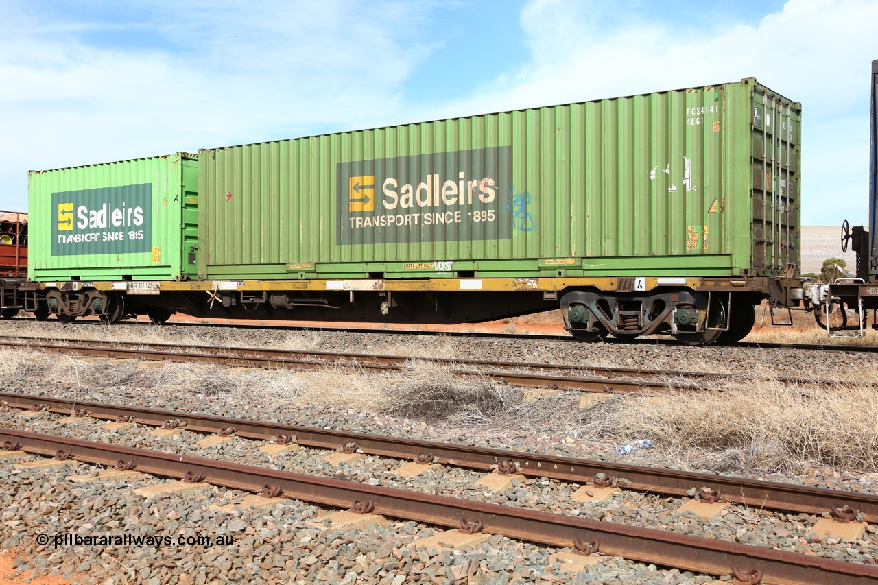 160523 3022
Parkeston, 7SP3 intermodal train, RQGY 35012 63' container waggon, one of a hundred OCY type waggons built by Goninan NSW in 1975, recoded to NQOY, NQSY. Loaded with two Sadleirs boxes, a 40' 4EG1 type RCS 4141 and a 20' 2EB0 type RCSB 5106.
Keywords: RQGY-type;RQGY35012;Goninan-NSW;OCY-type;