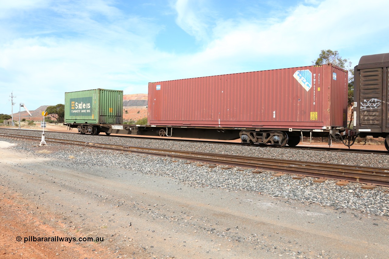 160523 3044
Parkeston, 7SP3 intermodal train, RQJW 22081 jumbo container waggon, one of fifty built in 1975-76 by Mittagong Engineering NSW as JCW type, recoded to NQJW loaded with a CPC 40' 4EG1 type box WPWU 098921 and Sadleirs 20' 2EB0 type box RCSB 5072.
Keywords: RQJW-type;RQJW22081;Mittagong-Engineering-NSW;JCW-type;NQJW-type;