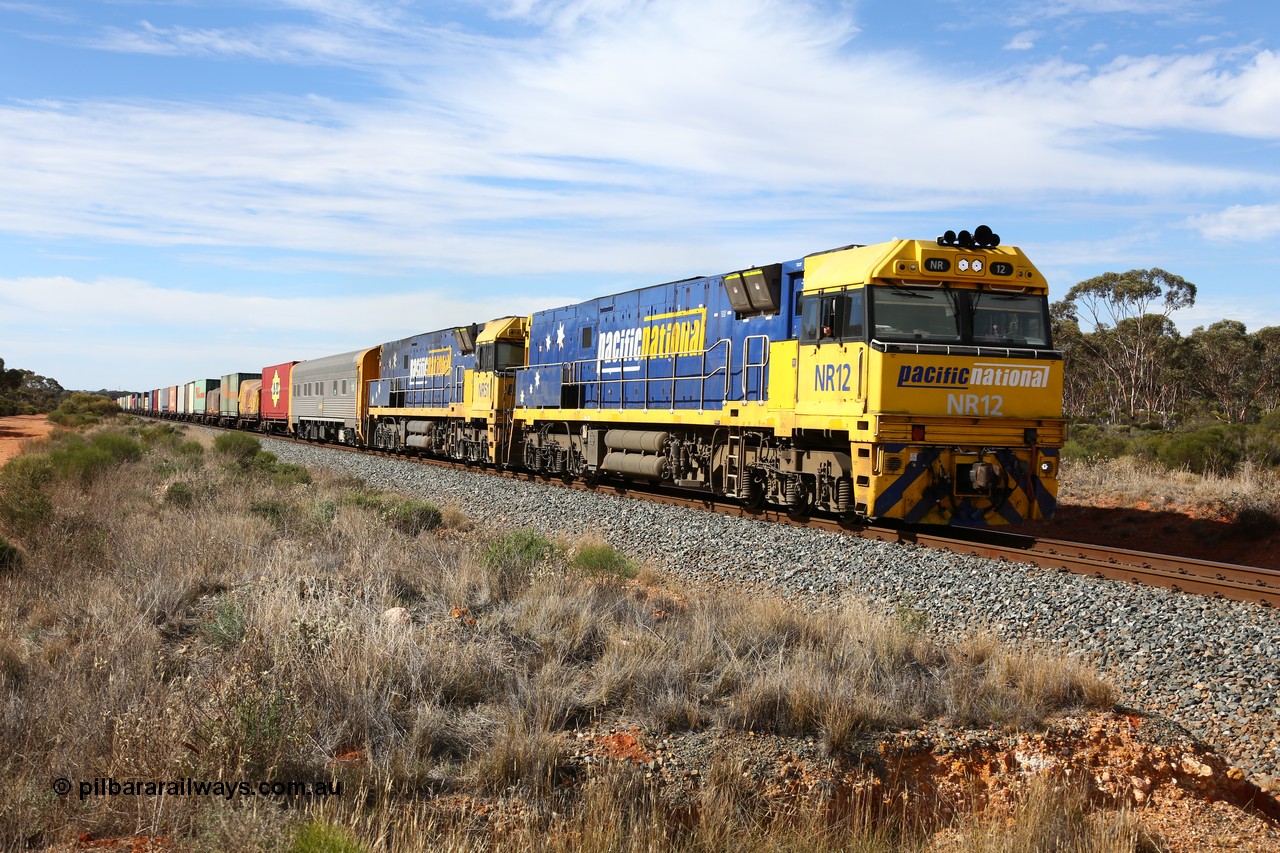 160523 3209
Binduli, Perth bound 7SP3 intermodal train, a pair of Goninan built GE model Cv40-9i NR class units NR 12 serial 7250-02/97-214 and NR 51 serial 7250-08/97-253 lead the train 'elephant style' near the 641 km.
Keywords: NR-class;NR12;Goninan;GE;Cv40-9i;7250-02/97-214;