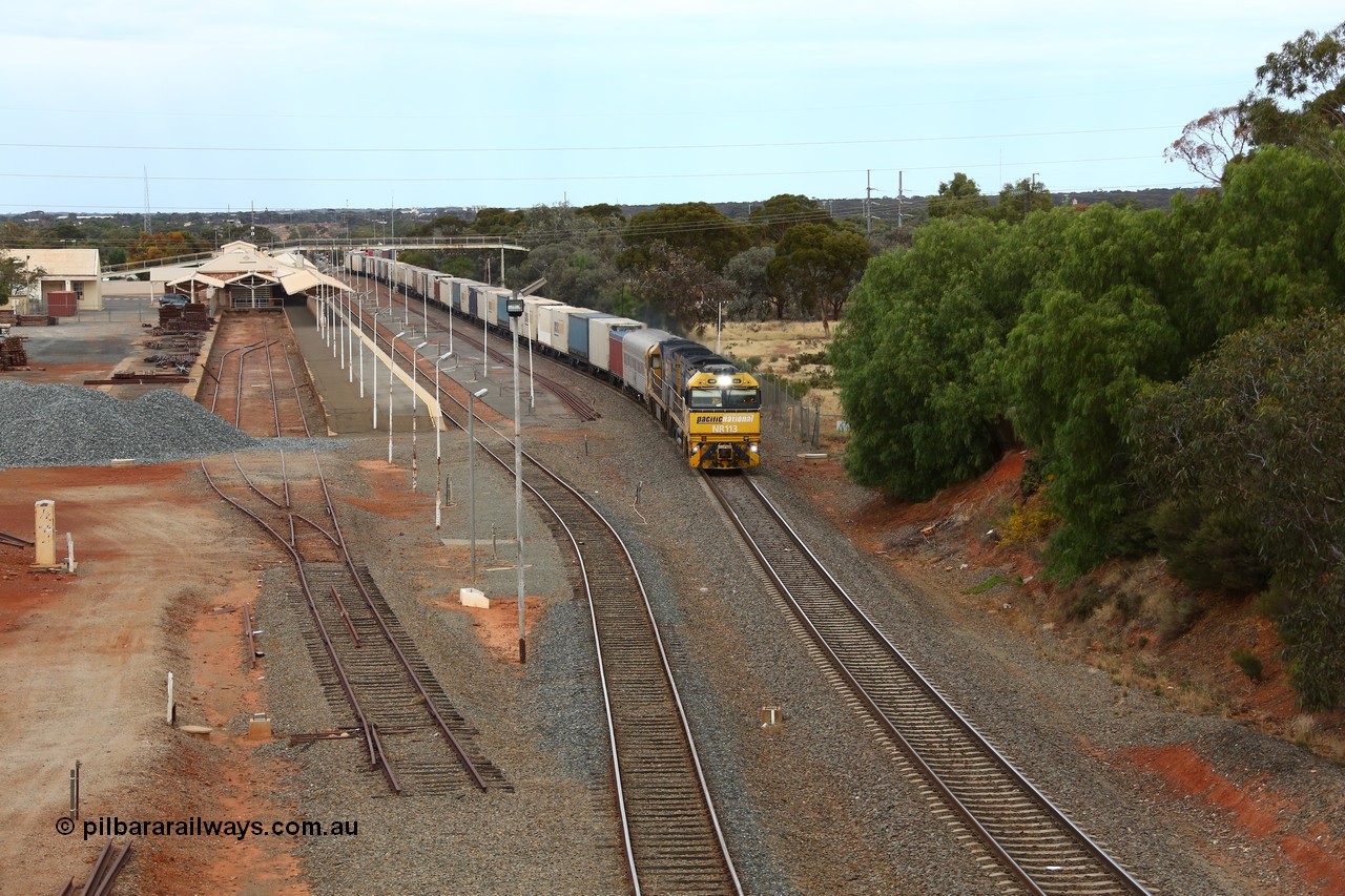 160524 3632
Kalgoorlie, priority service 2PS7 sneaks past the station behind Goninan built GE model Cv40-9i NR class unit NR 113 serial 7250-09/97-312, originally built for National Rail now in current owner Pacific National livery, the former dock remains with the track all but removed.
Keywords: NR-class;NR113;Goninan;GE;Cv40-9i;7250-09/97-312;