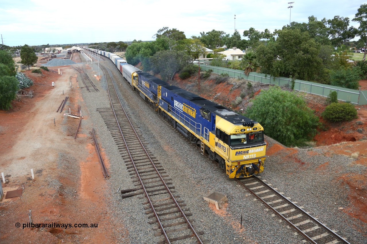 160524 3636
Kalgoorlie, priority service 2PS7 passes the station environs behind Goninan built GE model Cv40-9i NR class unit NR 113 serial 7250-09/97-312, originally built for National Rail now in current owner Pacific National livery, the timber sleepers still in situ for the points to the dock road.
Keywords: NR-class;NR113;Goninan;GE;Cv40-9i;7250-09/97-312;
