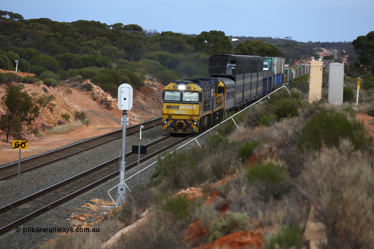 160524 3731
West Kalgoorlie, 2PM6 intermodal train passes the local 2 km post for the Esperance line as it arrives behind Goninan built GE model Cv40-9i NR class units NR 101 serial 7250-07/97-303 and NR 105 serial 7250-08/97-310, originally built for National Rail now in current owner Pacific National livery.
Keywords: NR-class;NR101;Goninan;GE;Cv40-9i;7250-07/97-303;