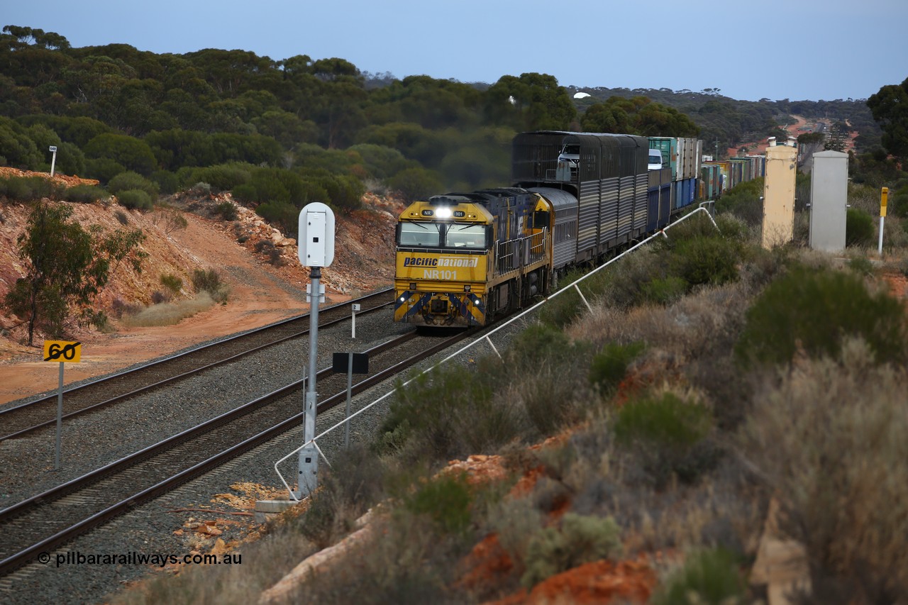 160524 3732
West Kalgoorlie, 2PM6 intermodal train passes the local 2 km post for the Esperance line as it arrives behind Goninan built GE model Cv40-9i NR class units NR 101 serial 7250-07/97-303 and NR 105 serial 7250-08/97-310, originally built for National Rail now in current owner Pacific National livery.
Keywords: NR-class;NR101;Goninan;GE;Cv40-9i;7250-07/97-303;