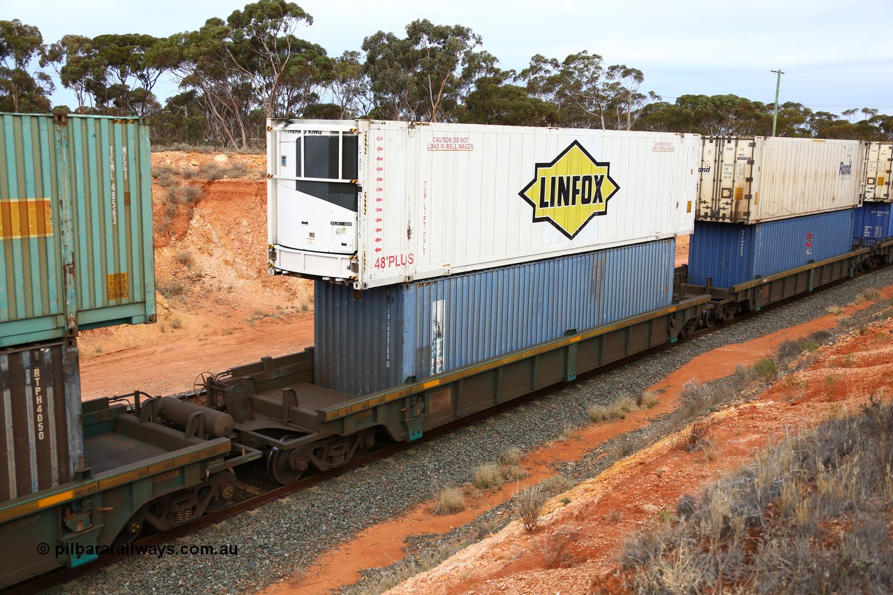 160524 3747
West Kalgoorlie, 2PM6 intermodal train, RRXY 3 platform 2 of 5-pack well waggon set, one of eleven built by Bradken Qld in 2002 for Toll from a Williams-Worley design with a 48' Linfox reefer FTAD 910801 on top of a Royal Wolf 40' box RWVU 400280.
Keywords: RRXY-type;RRXY3;Williams-Worley;Bradken-Rail-Qld;