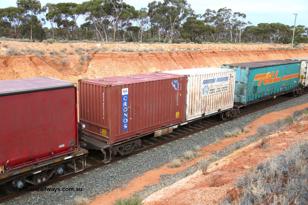 160524 3759
West Kalgoorlie, 2PM6 intermodal train, 40' platform of RRGY 7130 5-pack articulated skel waggon, one of fifty built by AN Rail Islington Workshops in 1996-97 as type RRBY, later rebuilt with 48' intermediate decks and coded RRGY, with two 20' boxes Cronos Bulker BSPD 084123 and Furniture Freighters FFA 12.
Keywords: RRGY-type;RRGY7130;AN-Islington-WS;RRBY-type;