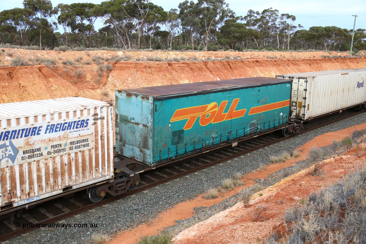 160524 3760
West Kalgoorlie, 2PM6 intermodal train, 48' platform of RRGY 7130 5-pack articulated skel waggon, one of fifty built by AN Rail Islington Workshops in 1996-97 as type RRBY, later rebuilt with 48' intermediate decks and coded RRGY, Toll 40' curtainsider 4TL135.
Keywords: RRGY-type;RRGY7130;AN-Islington-WS;RRBY-type;