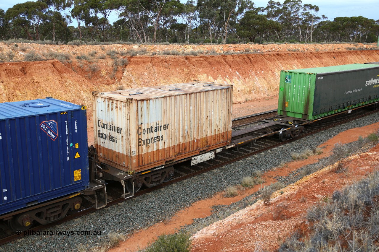 160524 3764
West Kalgoorlie, 2PM6 intermodal train, RRAY 7232 platform 1 of 5-pack articulated skel waggon set, one of 100 built by ABB Engineering NSW 1996-2000, with a 20' former TNT Container Express box B 9947 fitted with roof hatches.
Keywords: RRAY-type;RRAY7232;ABB-Engineering-NSW;