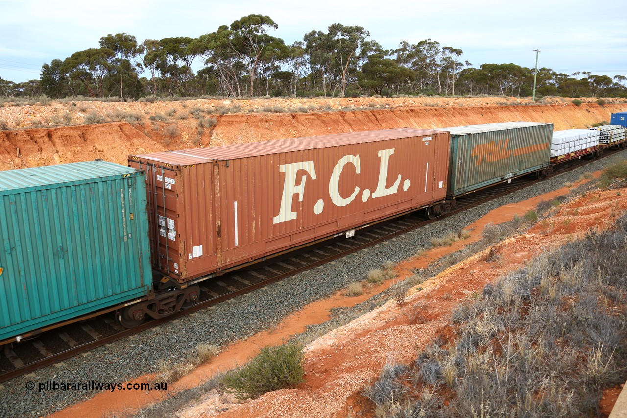 160524 3783
West Kalgoorlie, 2PM6 intermodal train, RRGY 7144 platform 2 of 5-pack articulated skeletal waggon set, one of fifty originally built by AN Rail Islington Workshops in 1996-97 as type RRBY, later rebuilt with 48' intermediate decks and recoded to RRGY, FCL 48' box FXGU 328034.
Keywords: RRGY-type;RRGY7144;AN-Islington-WS;RRBY-type;