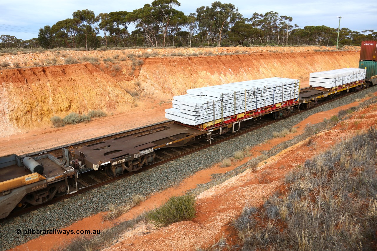 160524 3817
West Kalgoorlie, 2PM6 intermodal train, RQFY 119 container waggon, built by Victorian Railways Bendigo Workshops in 1980 as a batch of seventy five VQFX type skeletal container waggons, recoded to VQFY in 1985, recoded in April 1994 RQFY, May 1995 to RQFF and 2CM bogies fitted August 1995.
Keywords: RQFY-type;RQFY119;Victorian-Railways-Bendigo-WS;VQFX-type;VQFY-type;RQFF-type;